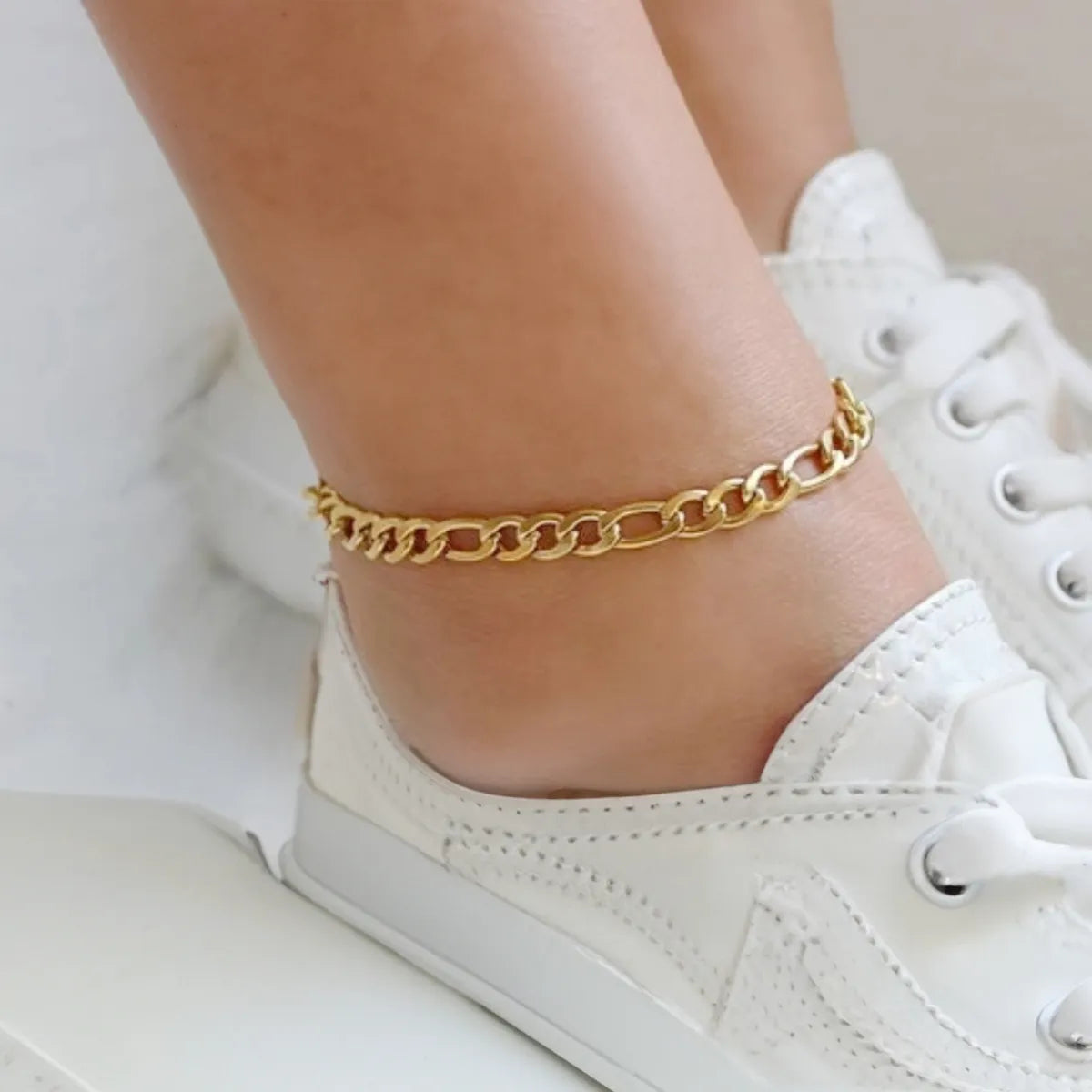 women wearing permanent anklets