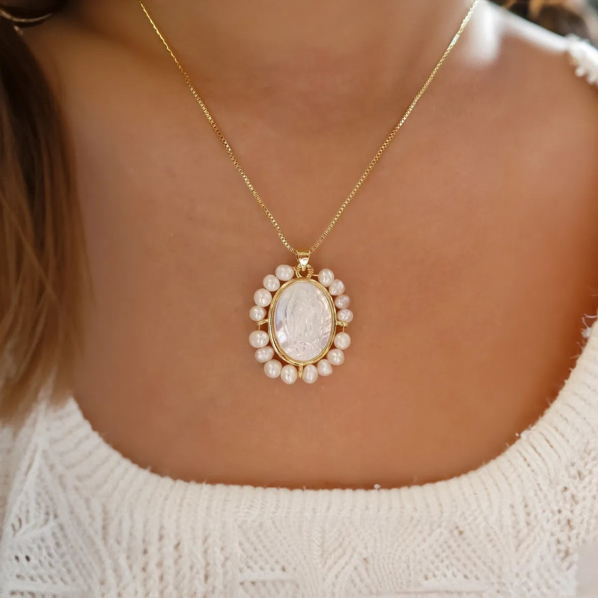 woman wearing pearl necklace