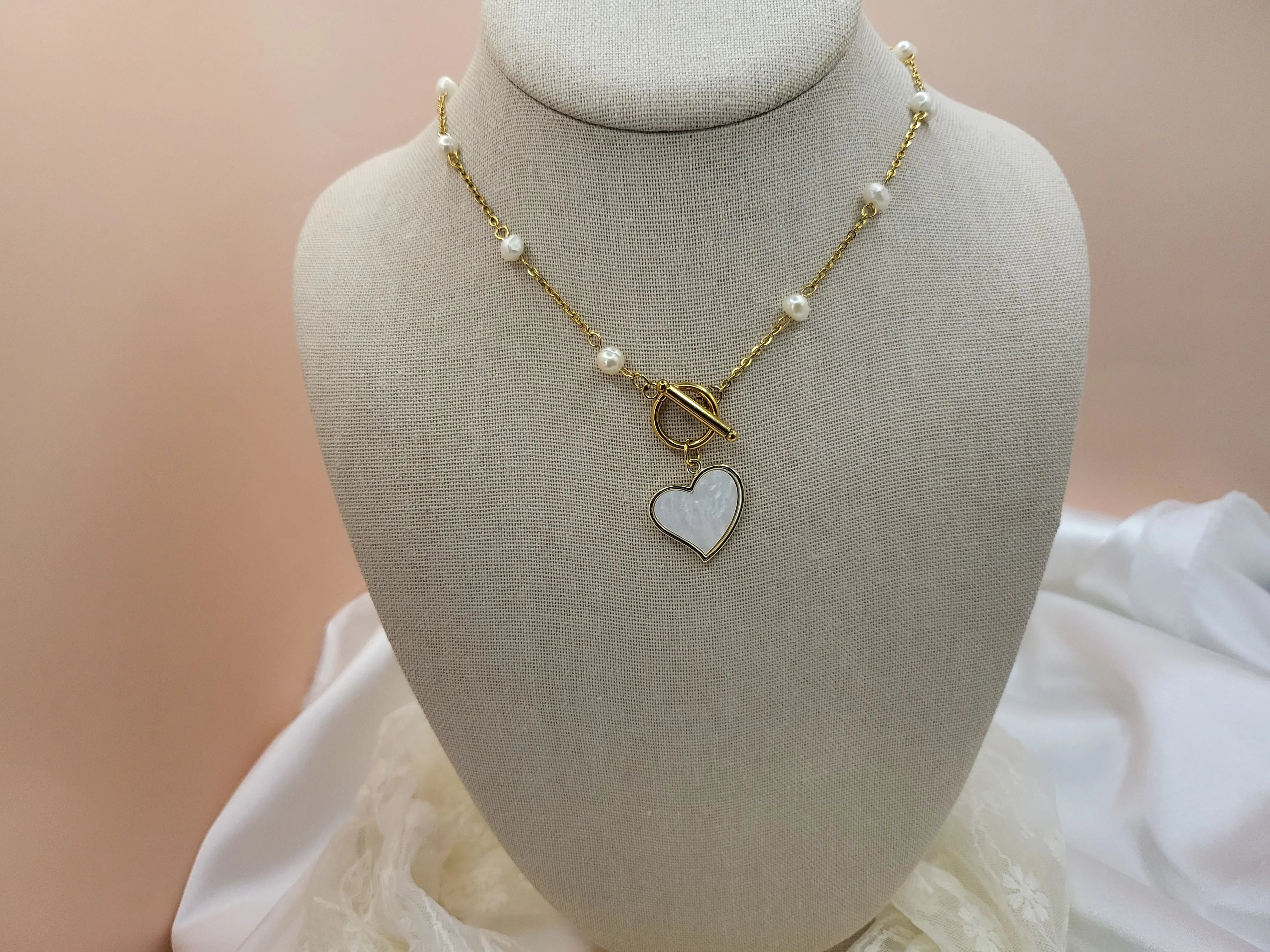 Eva Toggle Heart Necklace product images.