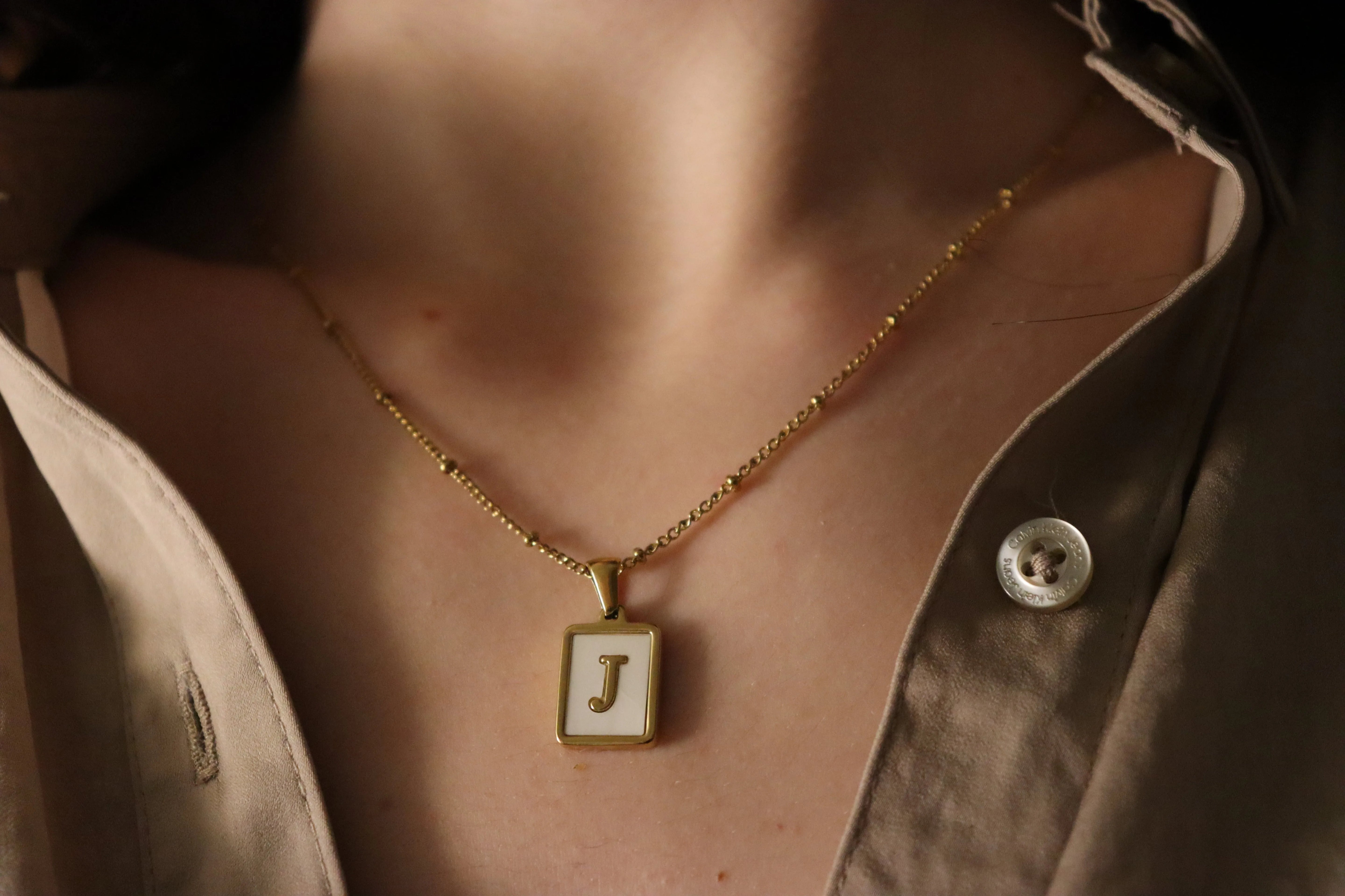 Gold Filled Mother Of Pearl Initial Necklace product images.