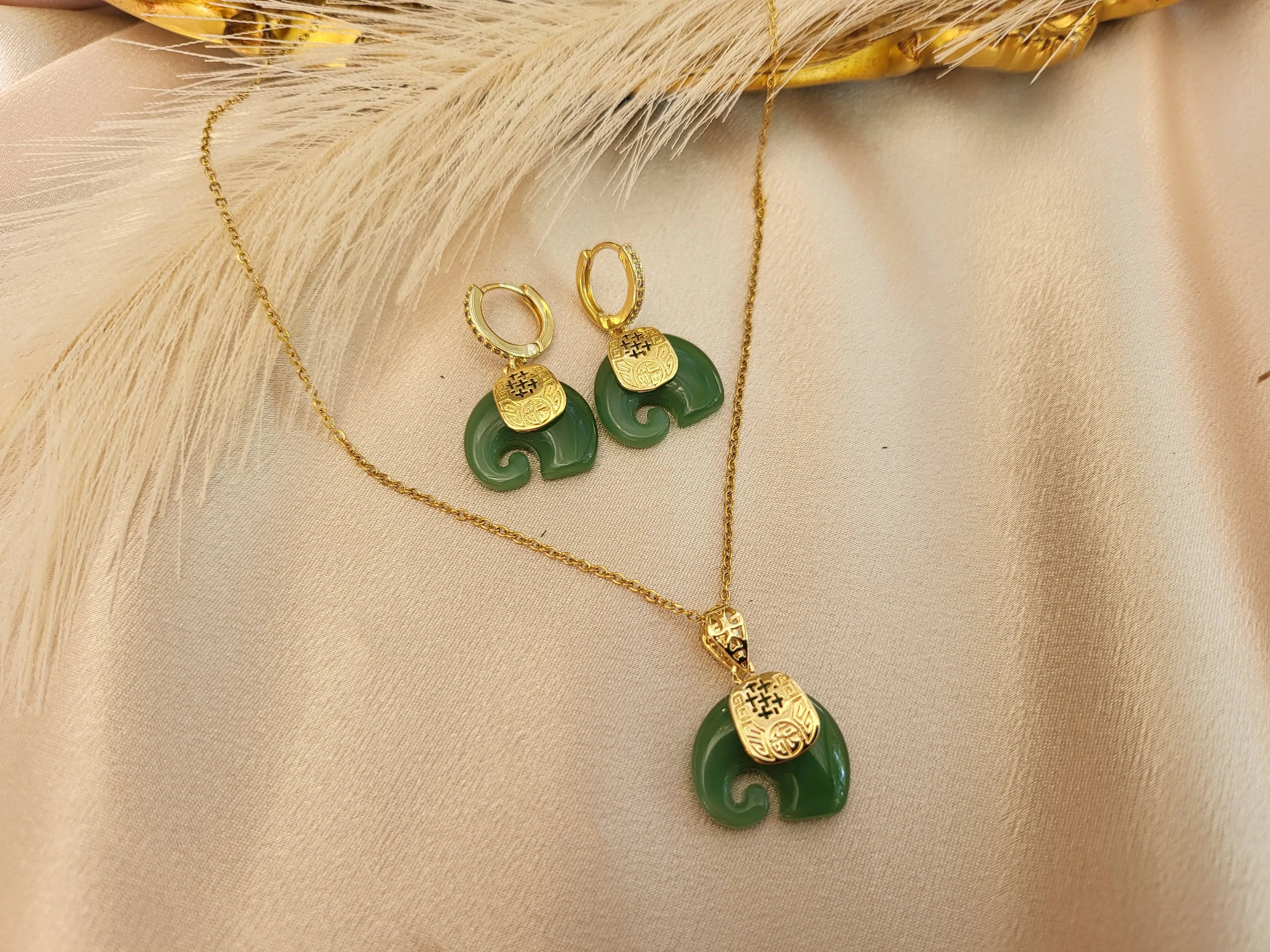Gold Jade Elephant Necklace product images.
