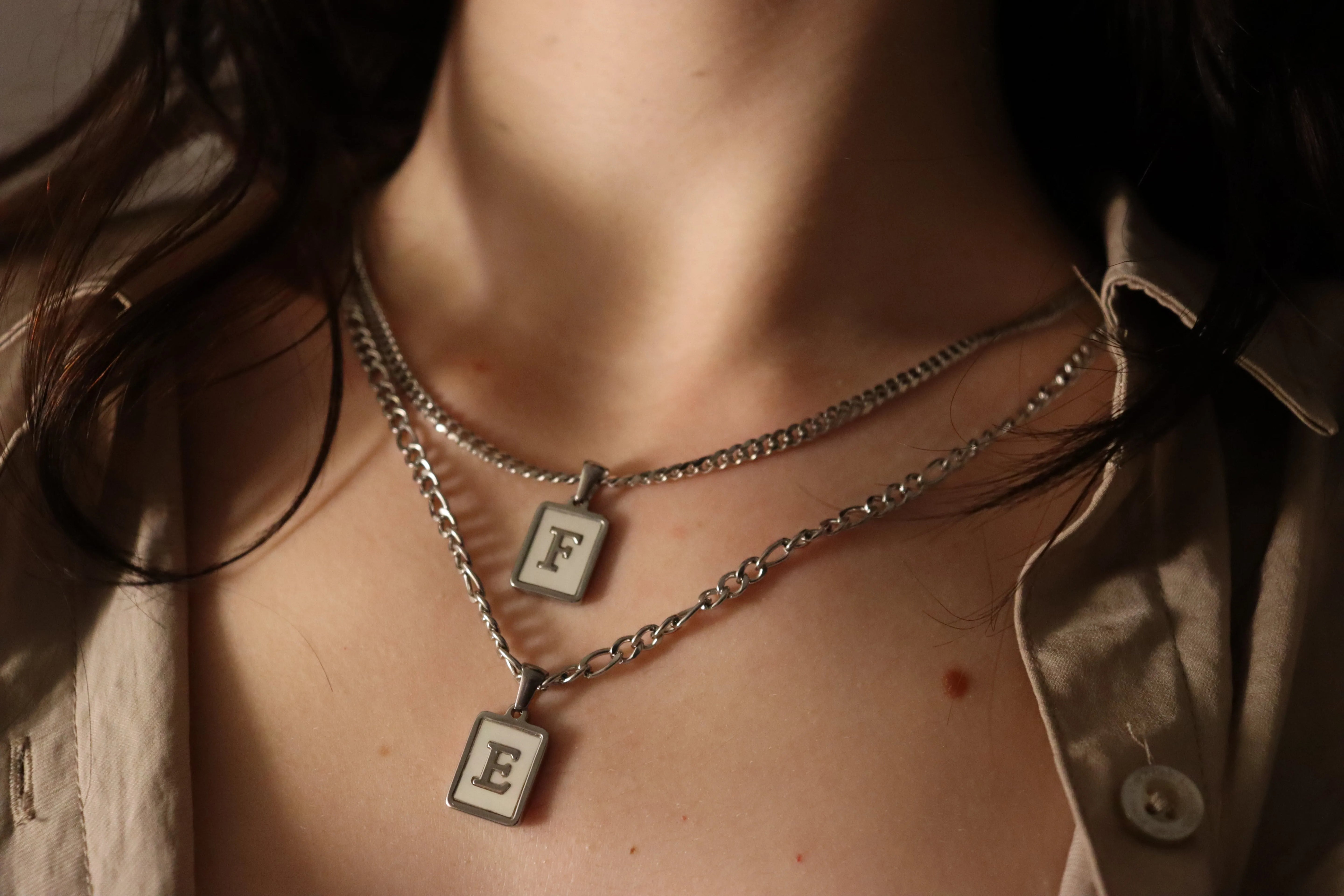 Silver Stainless Steel Mother Of Pearl Initial Necklace product images.