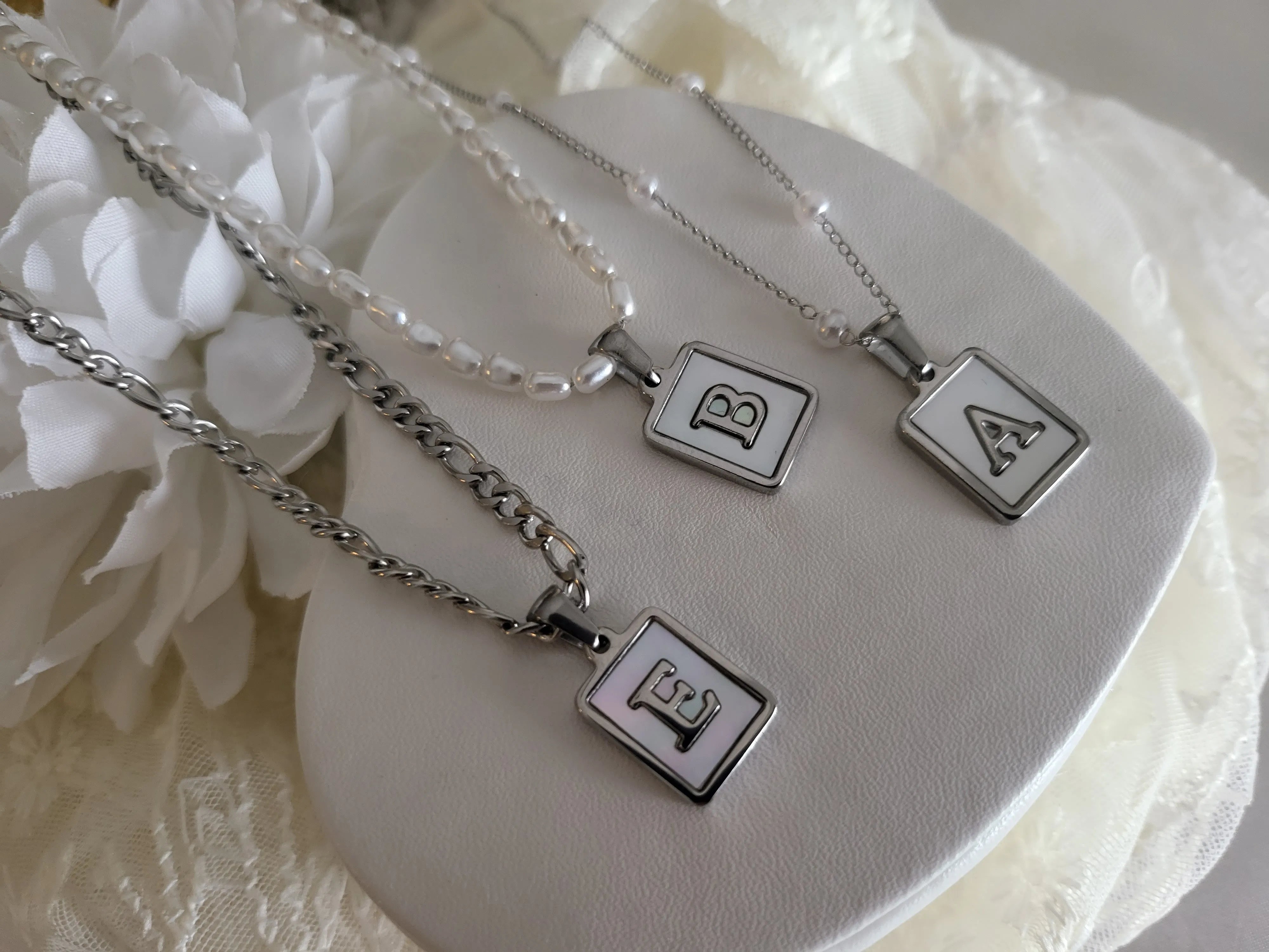 Silver Stainless Steel Mother Of Pearl Initial Necklace product images.